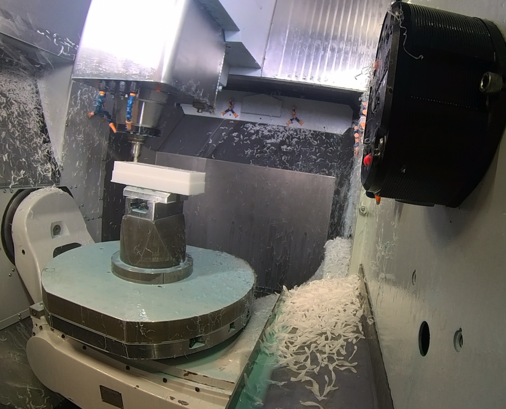 A Precision CNC Milling Machine in a machine shop.